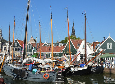 Zaanse Schans, Amsterdamse grachten en paling proeven Volendam